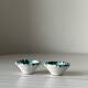 Ceramic salt and pepper shakers, green and white