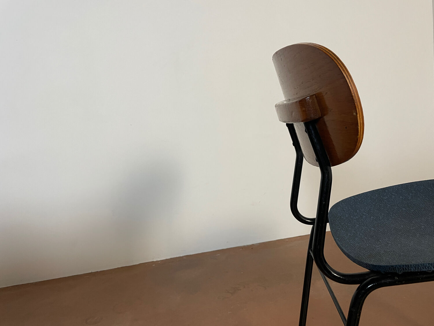 Wooden chairs and skaï