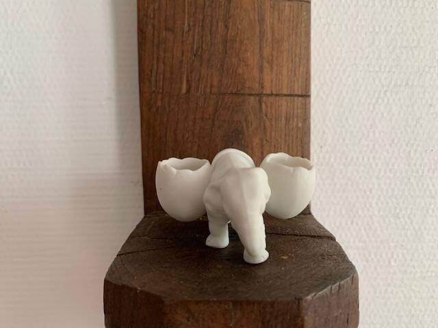 Small elephant in biscuit porcelain, 19th century salt cellars