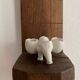 Small elephant in biscuit porcelain, 19th century salt cellars