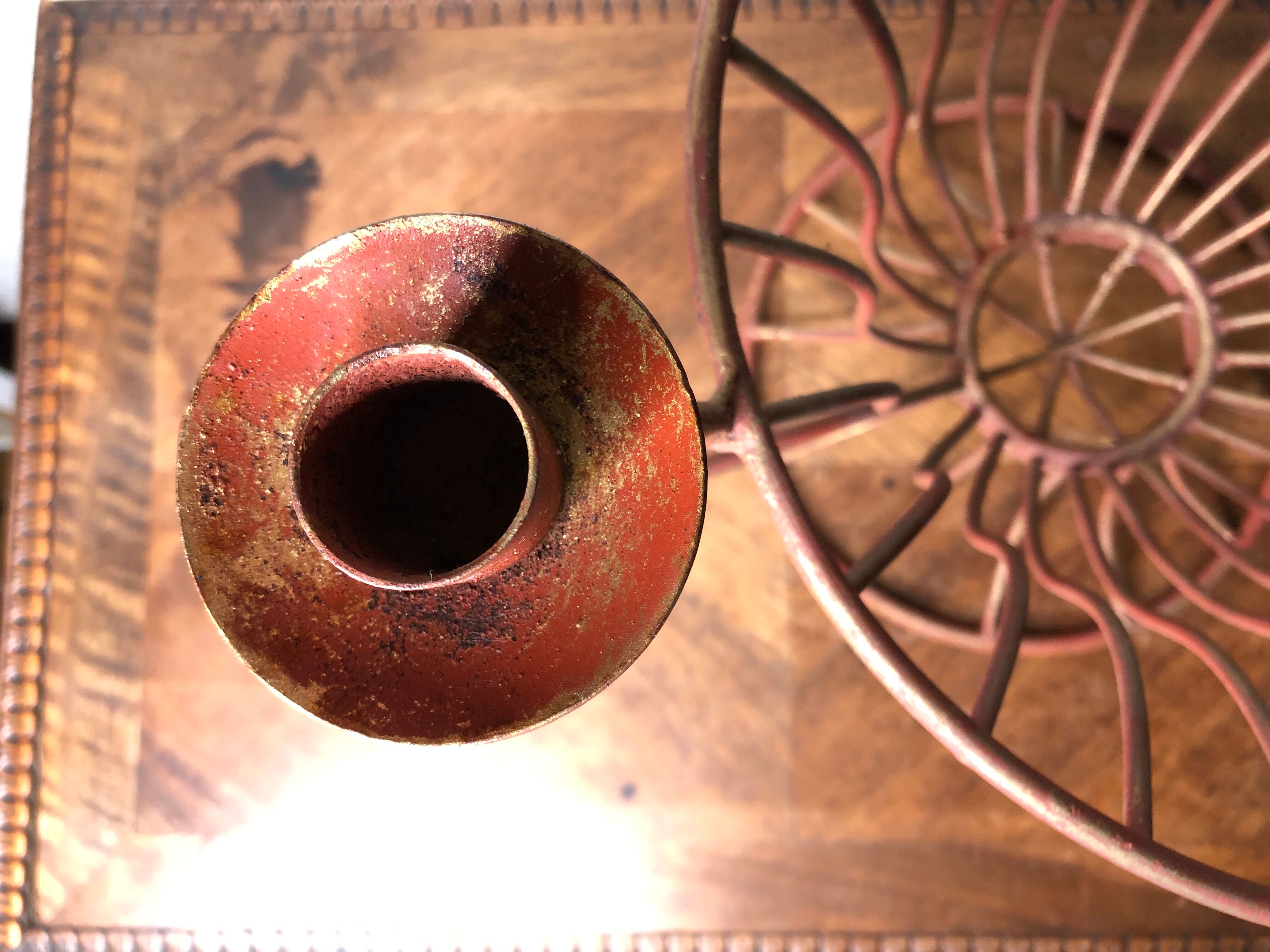 Metal basket with candlesticks