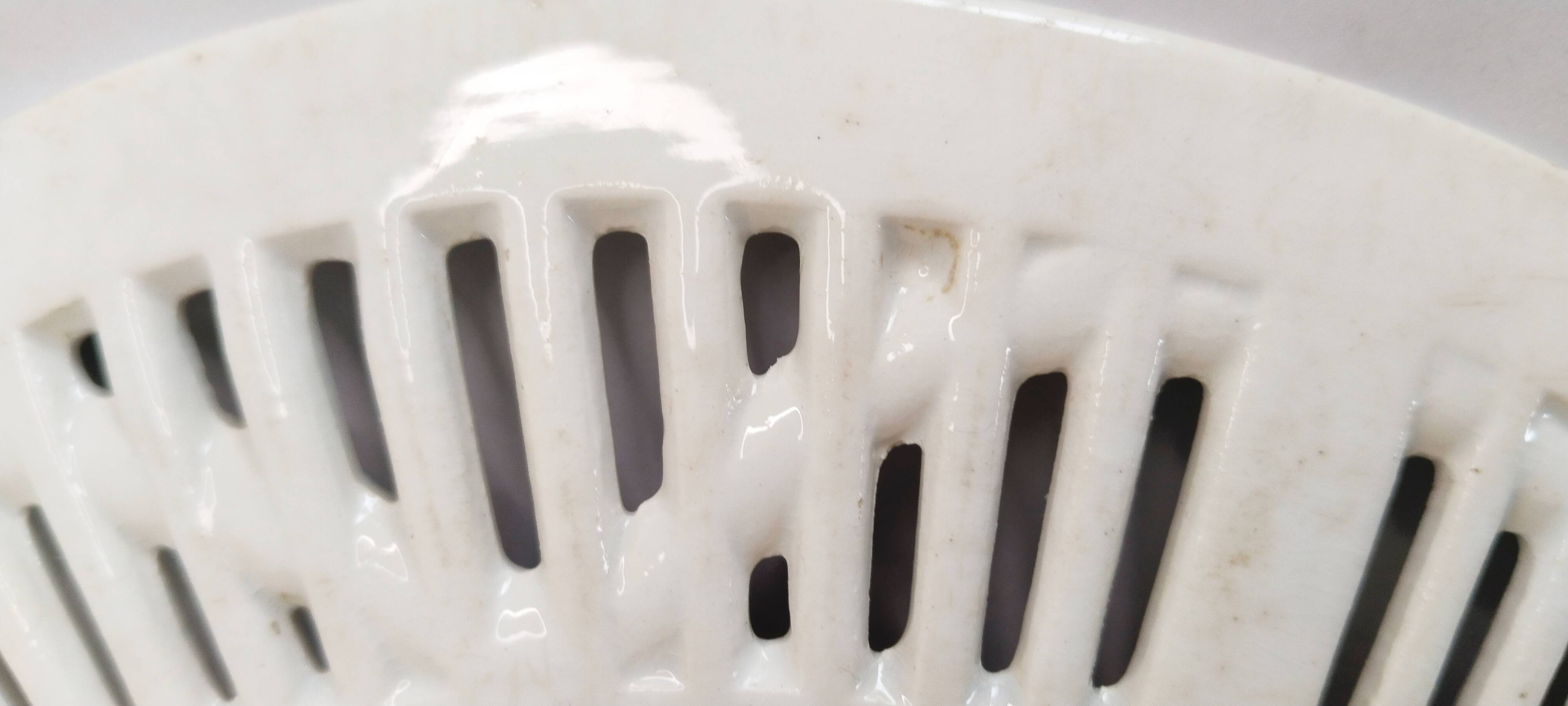Oval dish in openwork earthenware from Sarreguemines, blue ribbon and fruit