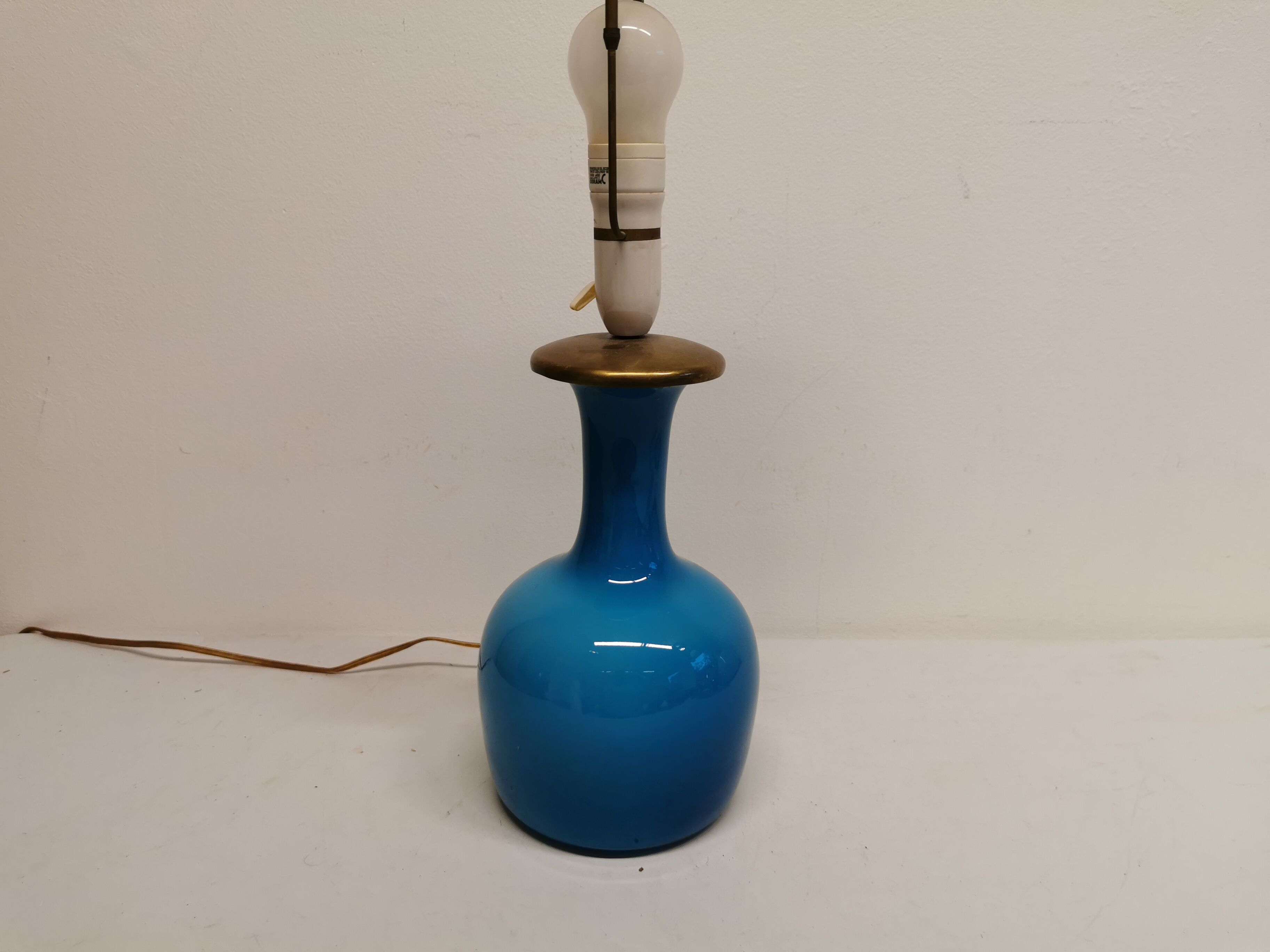 Sea blue glass lamp with brass top