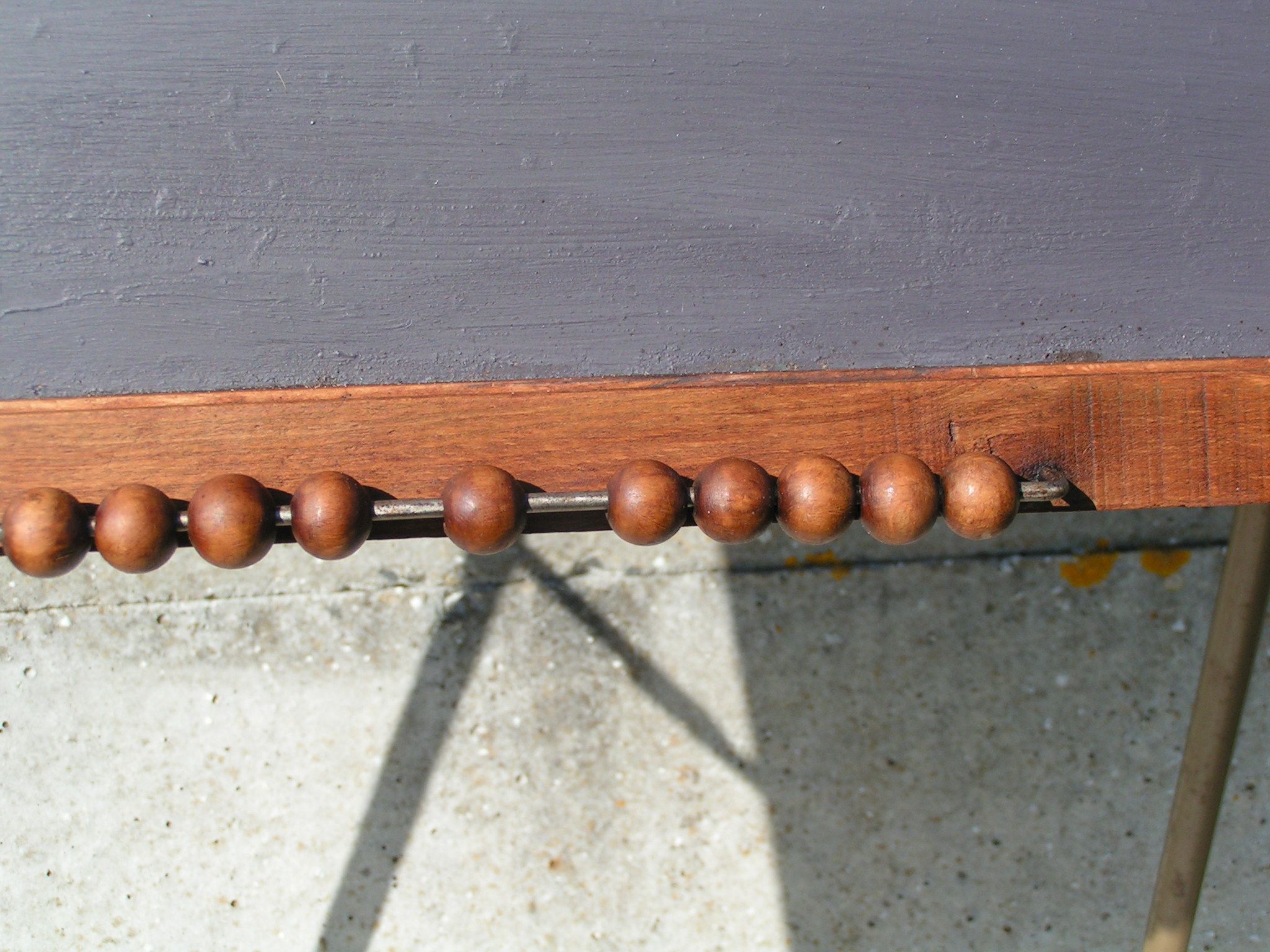 Schoolboy painting with abacus and rapose chalk metal feet