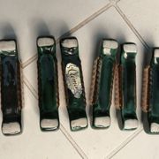 Ensemble repose-plat, dessous de bouteilles et porte-couteaux Art Déco