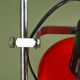 Red and black Aluminor floor lamp with two lights from the 1960s.