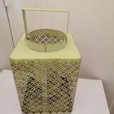 Metal lanterns with garden candles