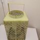 Metal lanterns with garden candles