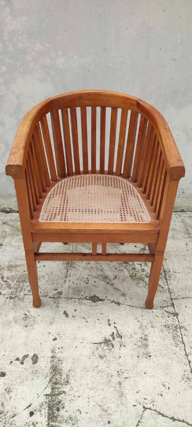 Old vintage teak wood cane armchair