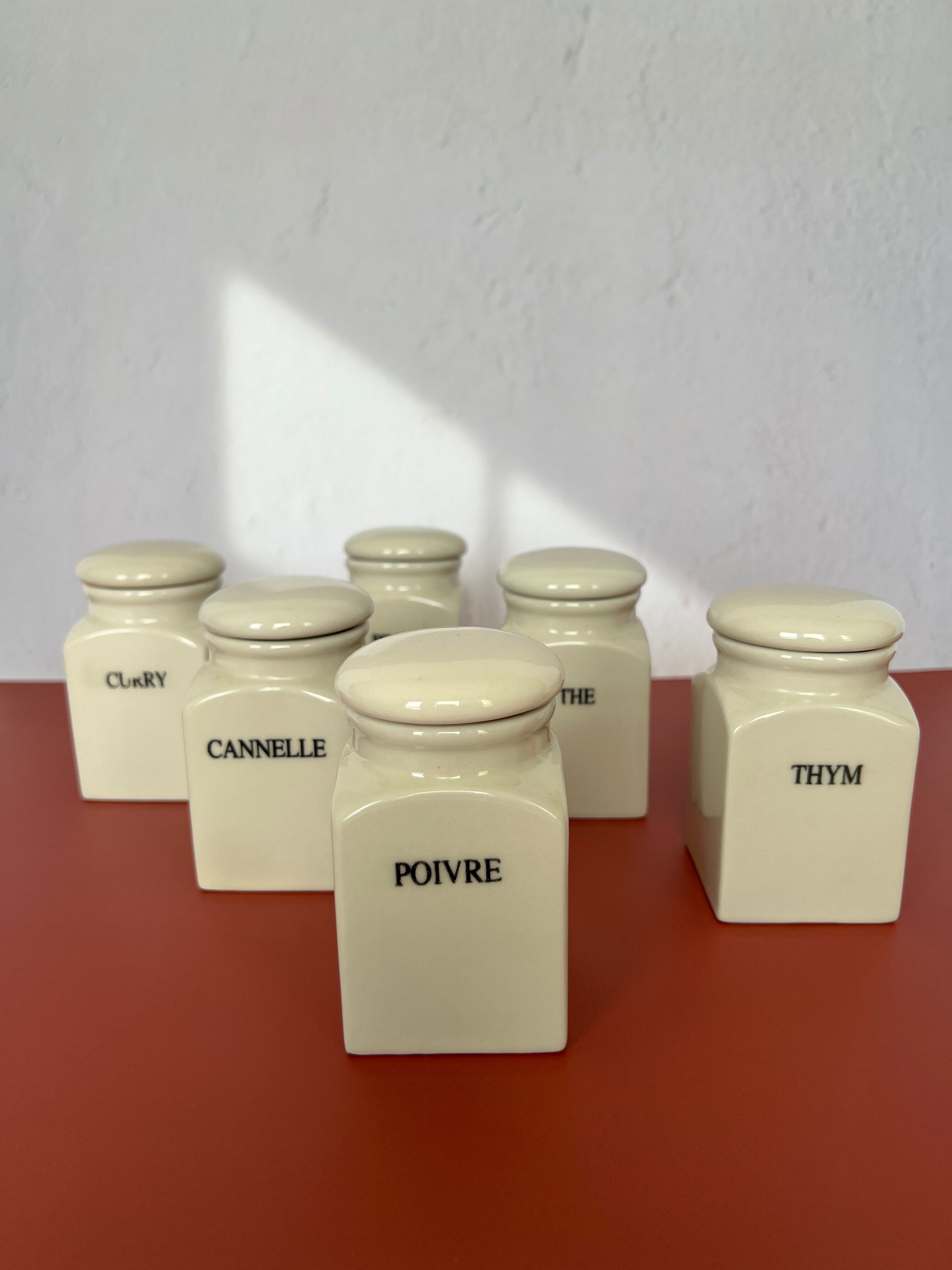 Set of vintage porcelain spice jars