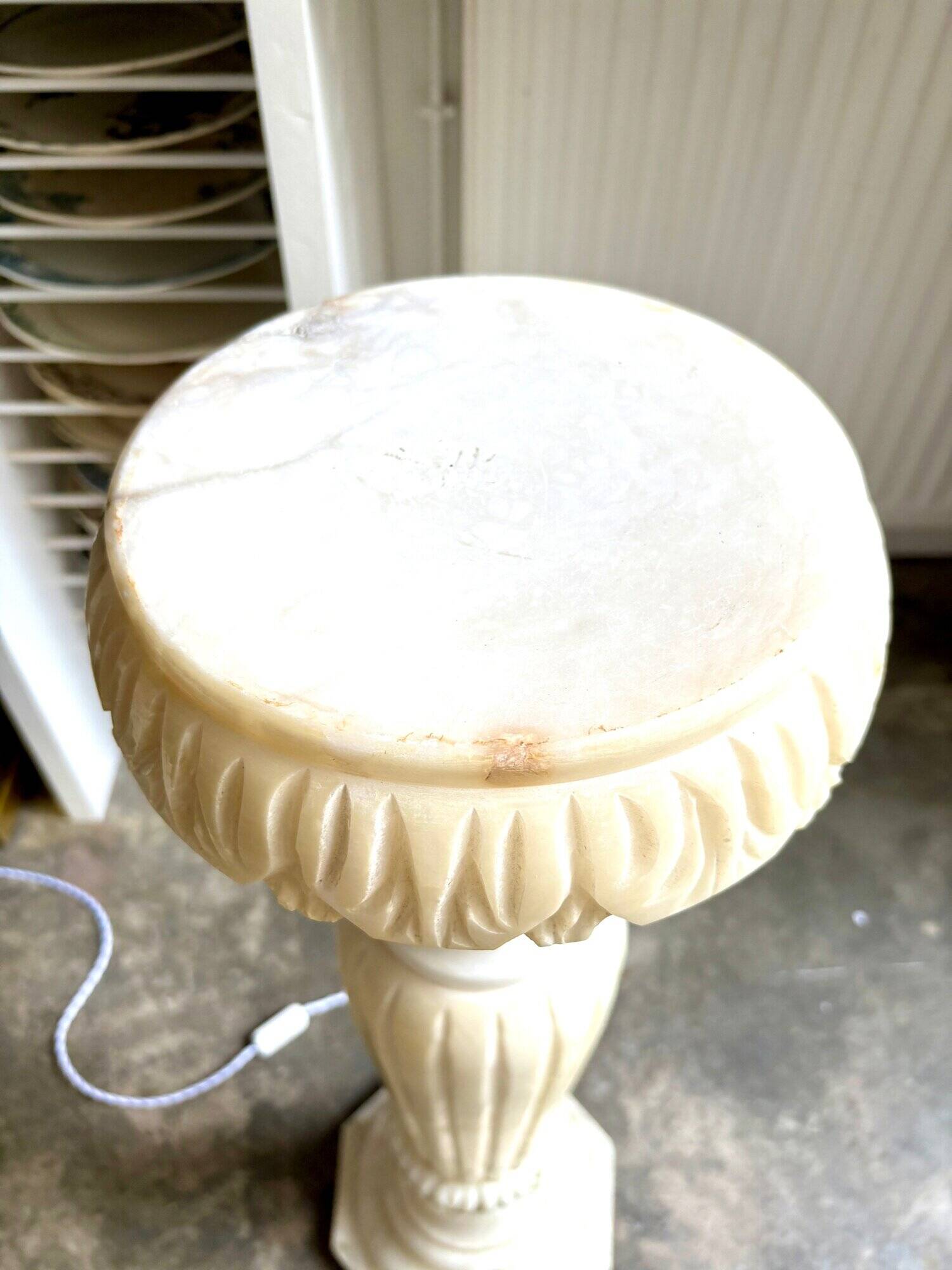 Column, illuminated alabaster saddle