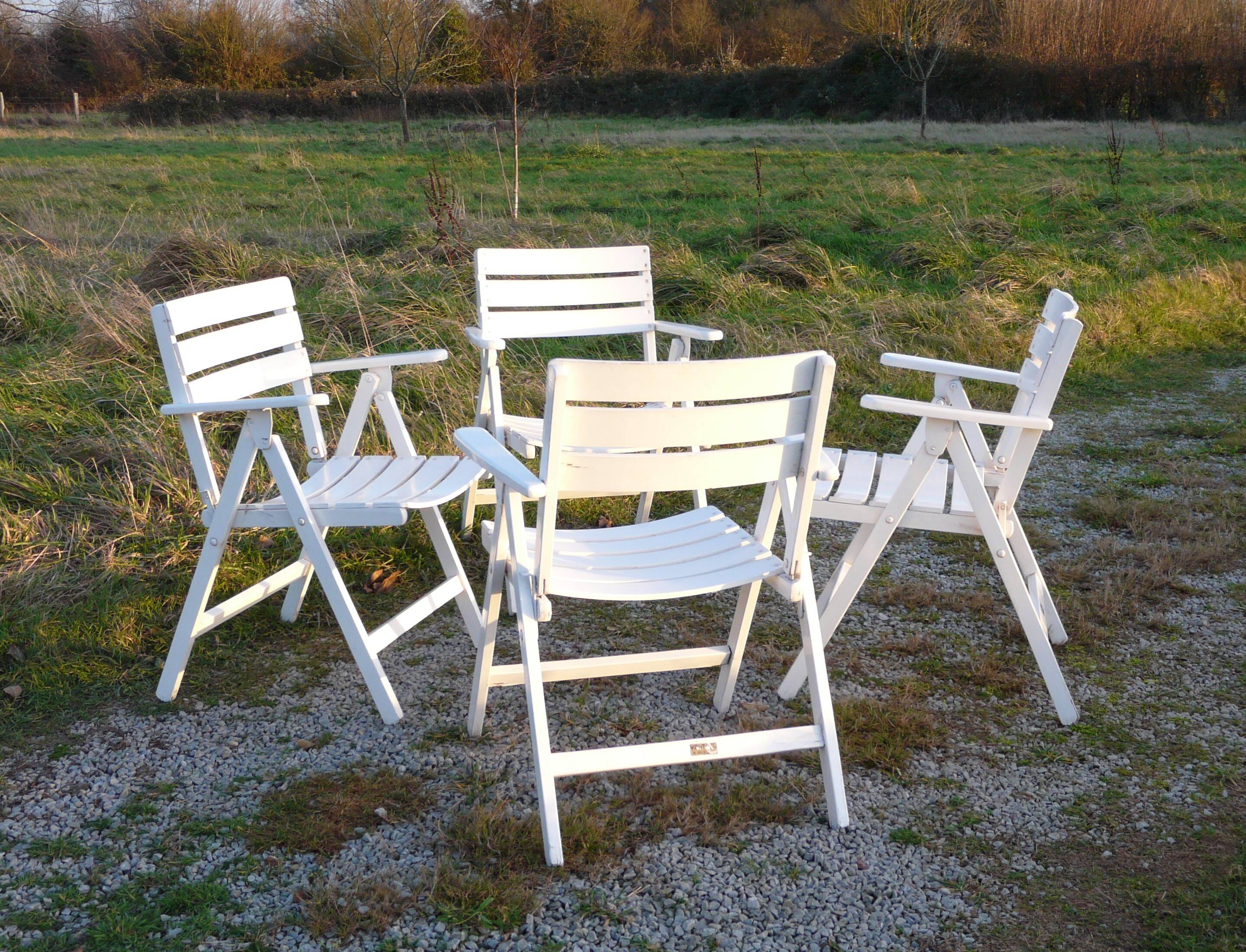 Four vintage wooden garden armchairs from the 1950s