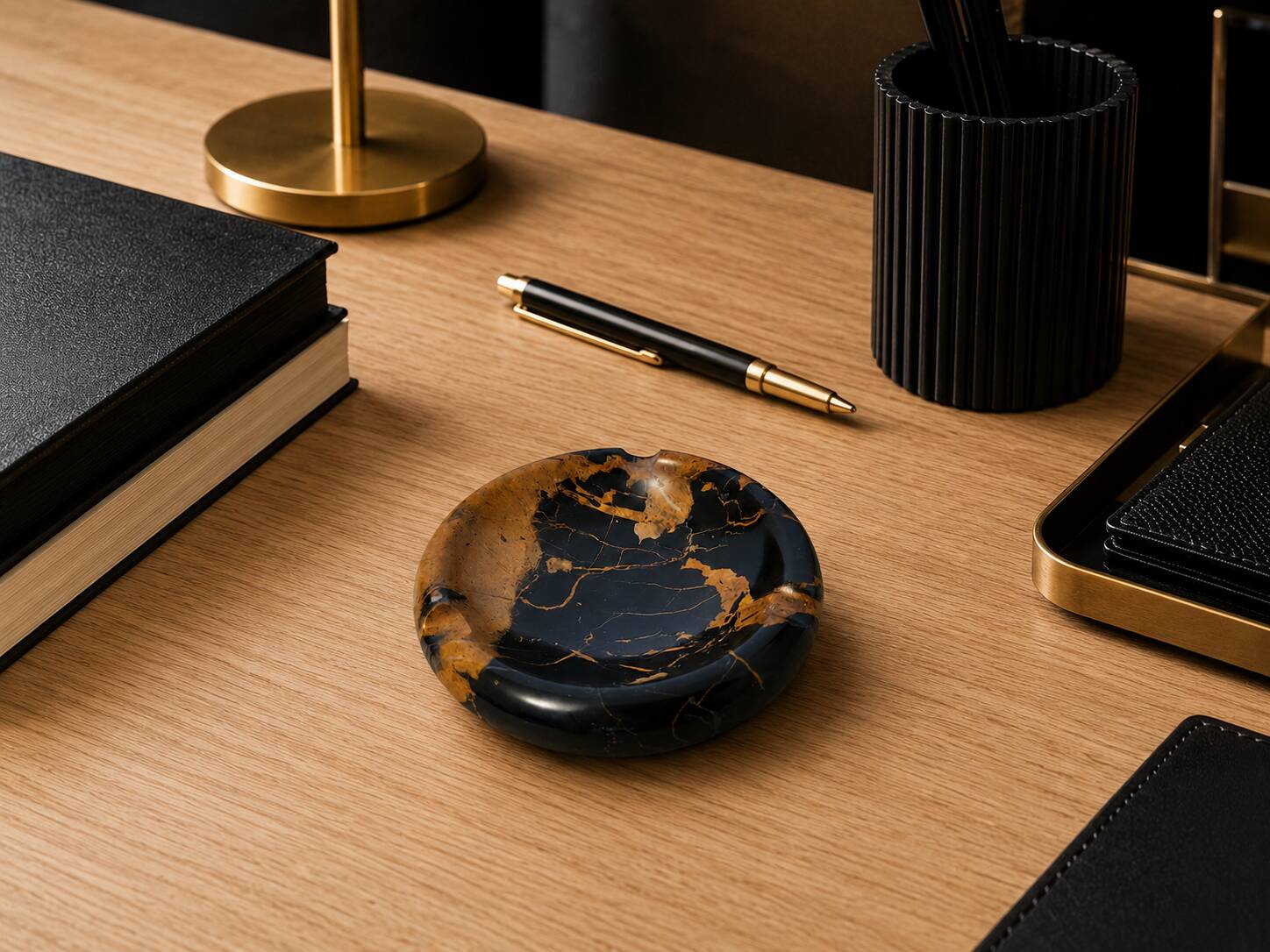 Vintage round ashtray in Italian black and gold Portoro marble.