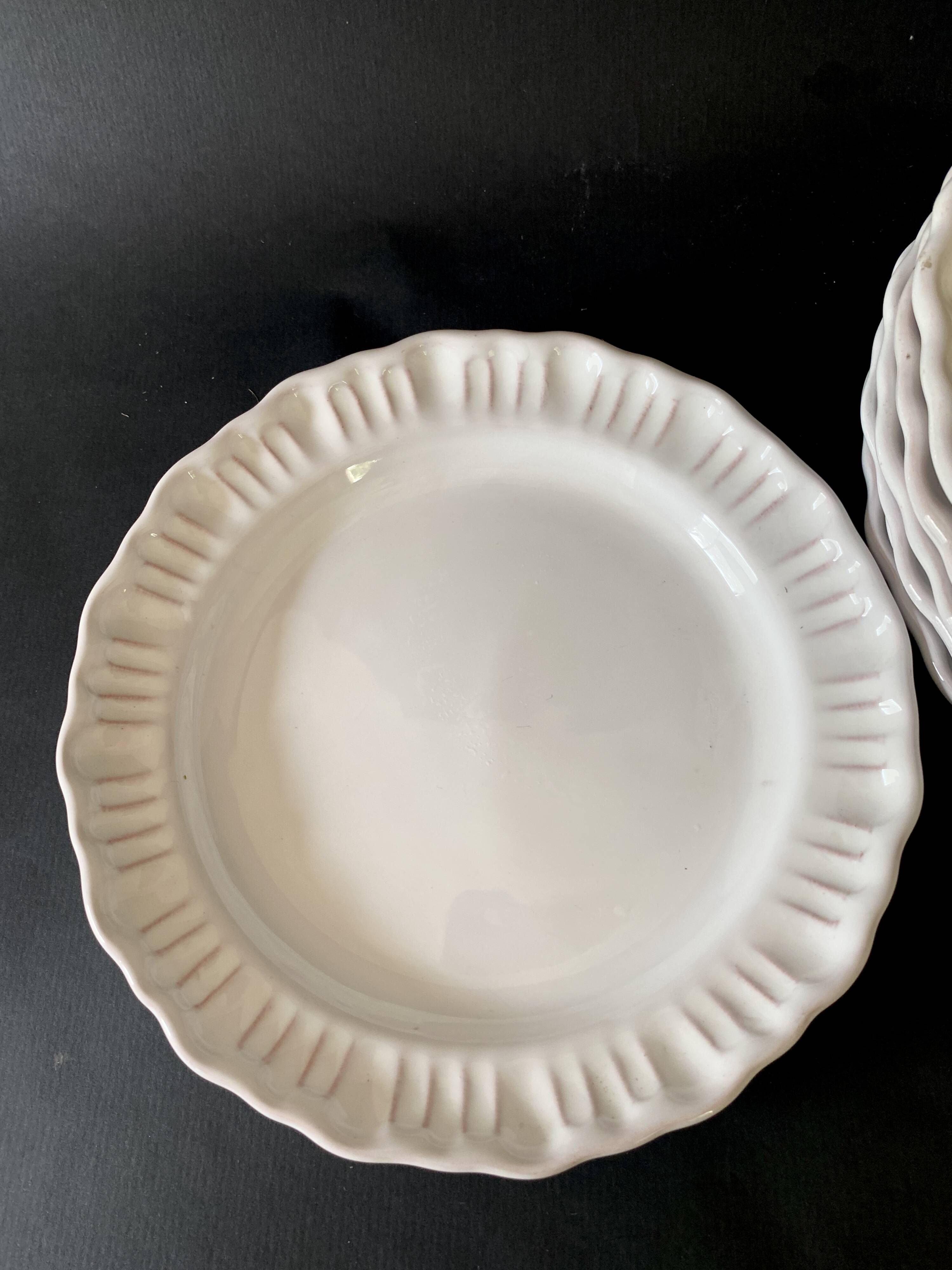 8 Provençal enamelled earthenware plates