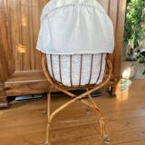 Bamboo, rattan, wicker cradle bassinet from the 1960s with a foldable support.
