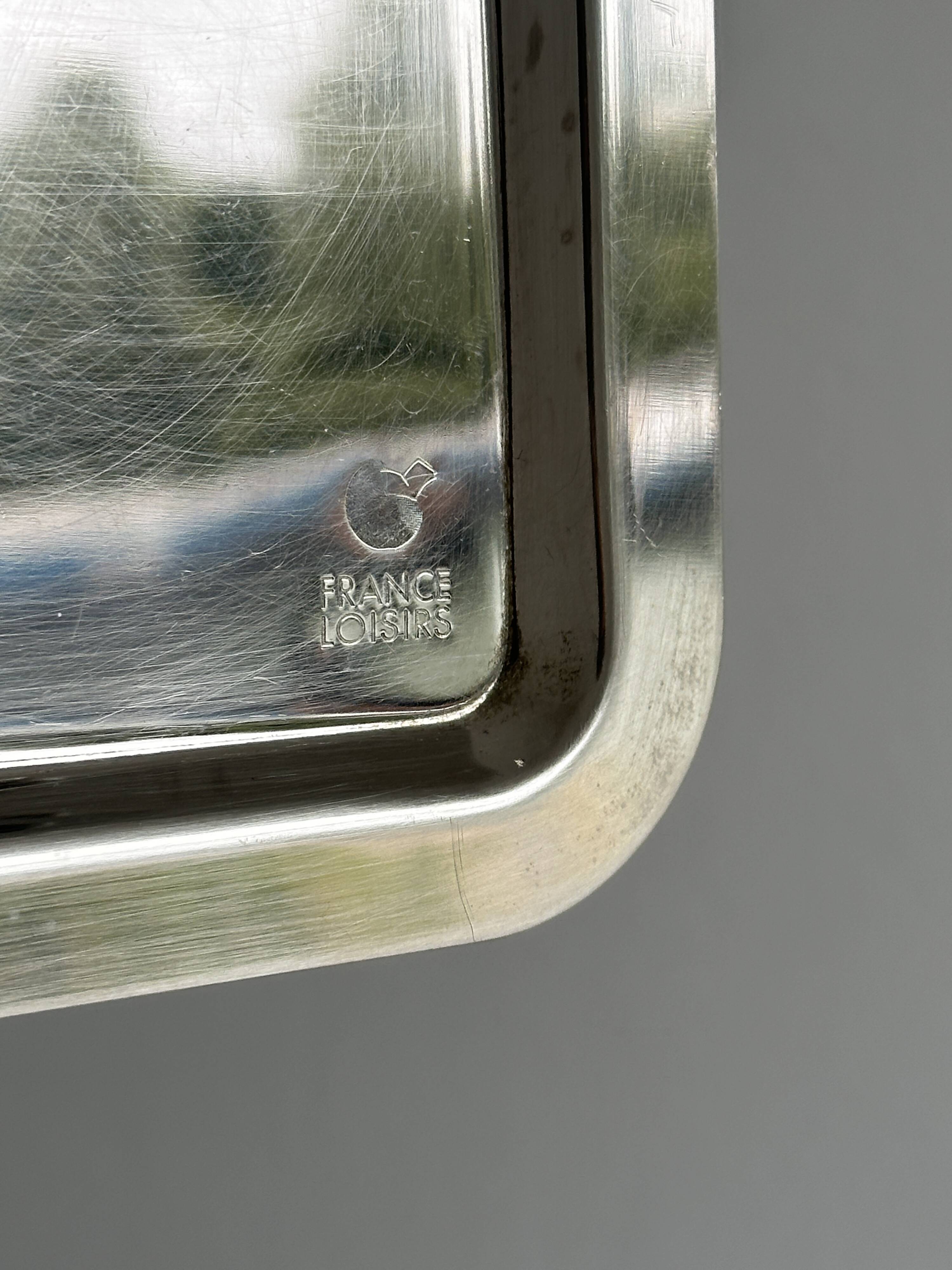 Small vintage metal tray with decorative knot