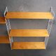 Vintage wall shelving unit by Nisse Strinning for String AB. 1950s