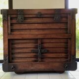 Japanese antique wooden chest with black fittings.