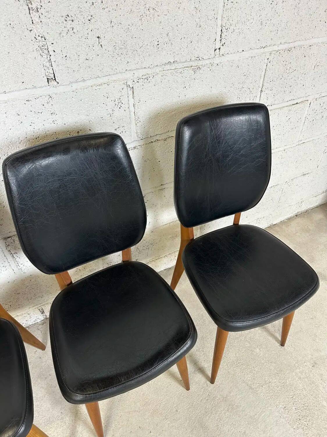 Set of 4 vintage chairs in black leatherette