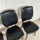 Set of 4 vintage chairs in black leatherette