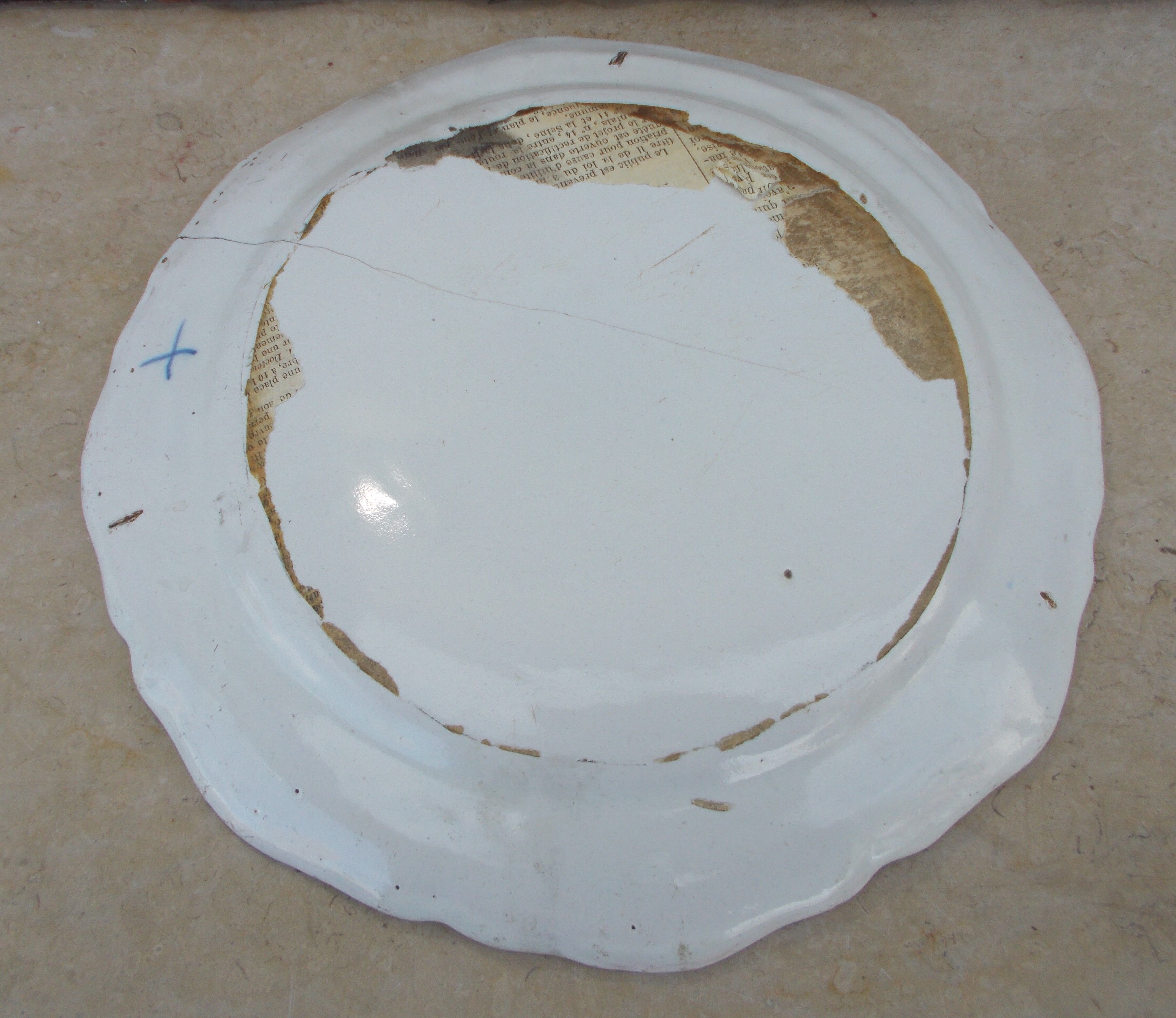 Old faience plate of Moustiers