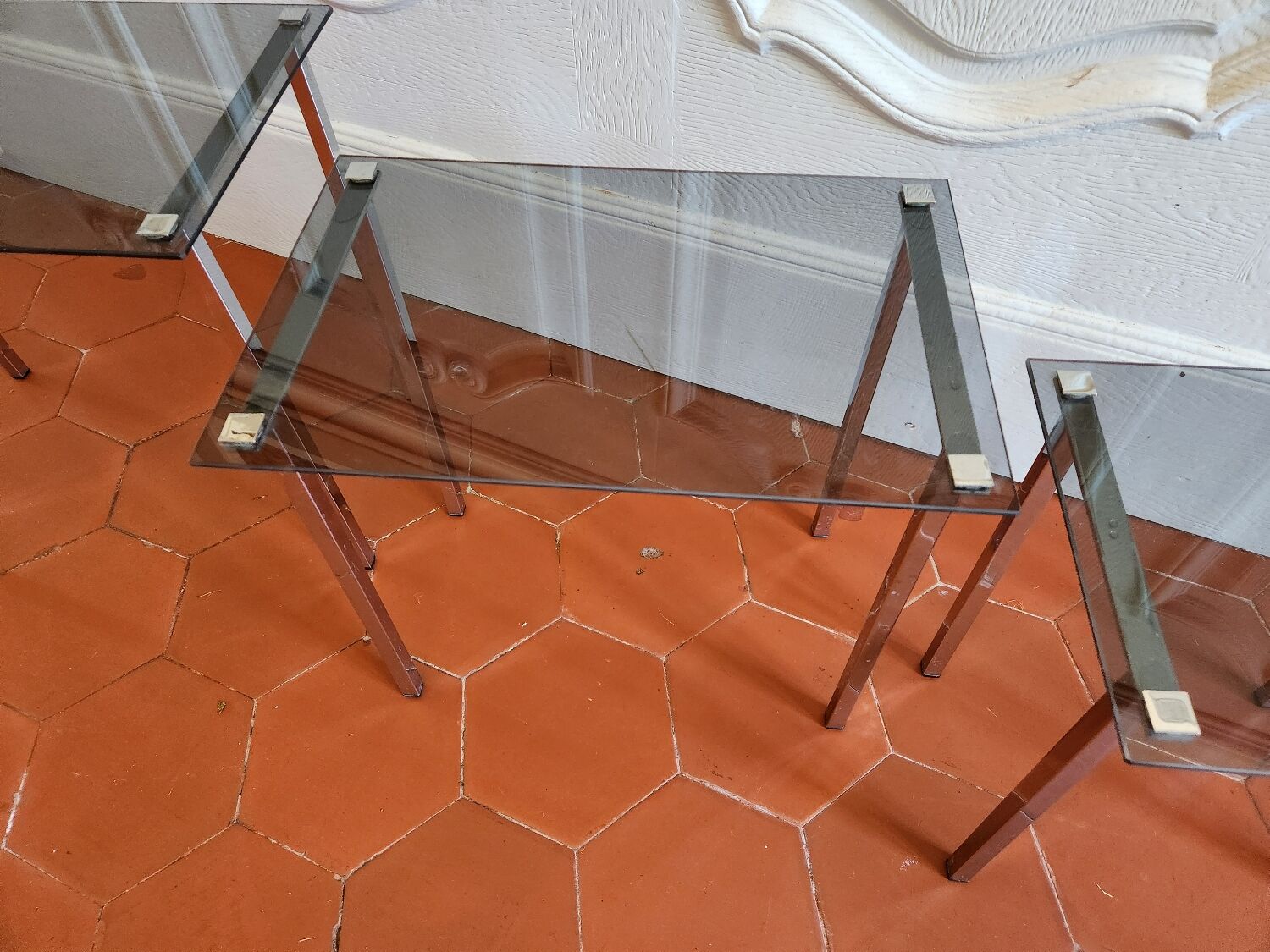 3 nesting tables from the 1970s in smoked glass.