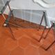 3 nesting tables from the 1970s in smoked glass.