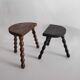 Pair of vintage tripod stools with turned wooden feet