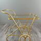 Rolling table cart in brass and glass, 20th century