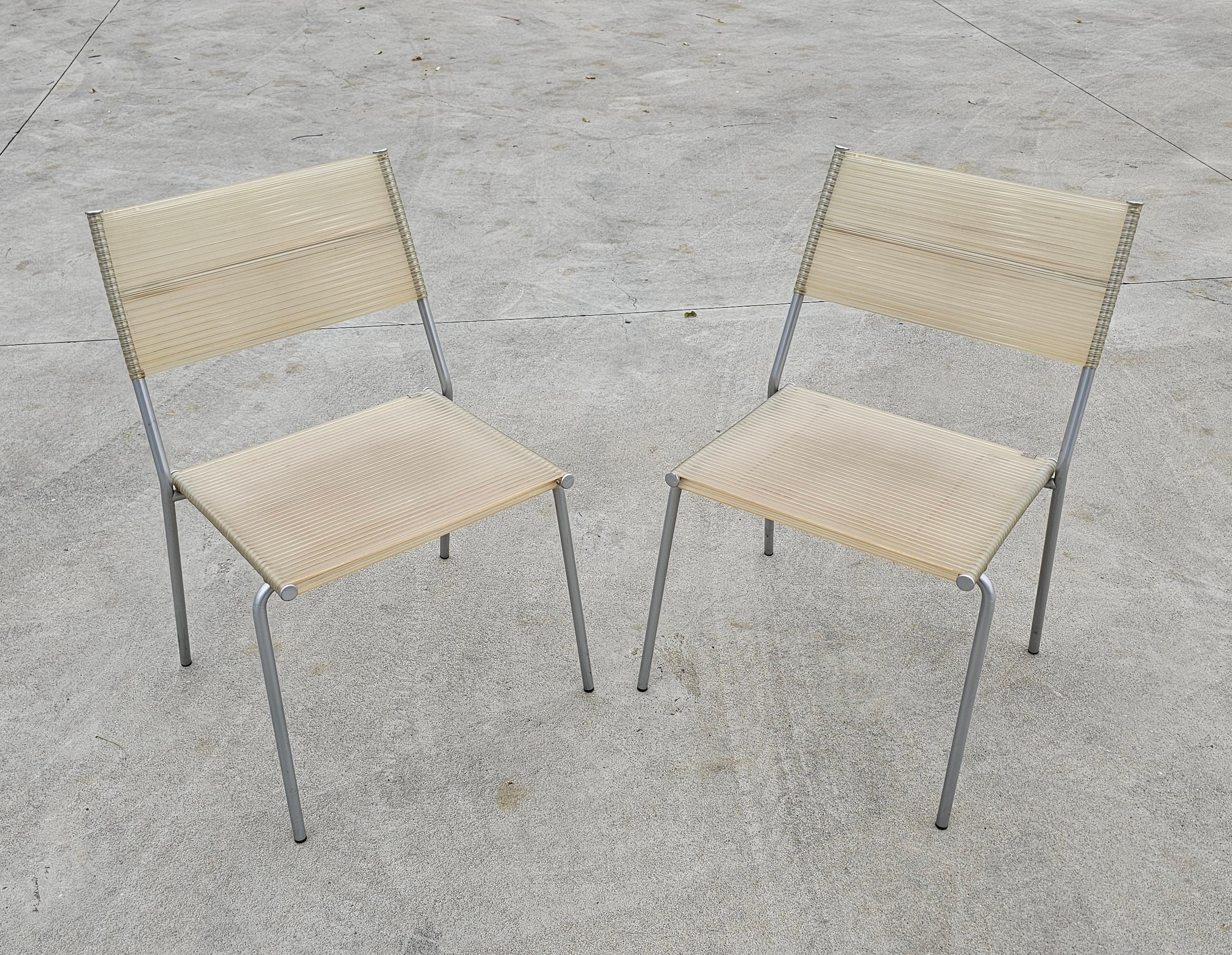 Set of 4 Miss B dining chairs by Tito Agnoli for Bonacina, 1990s.