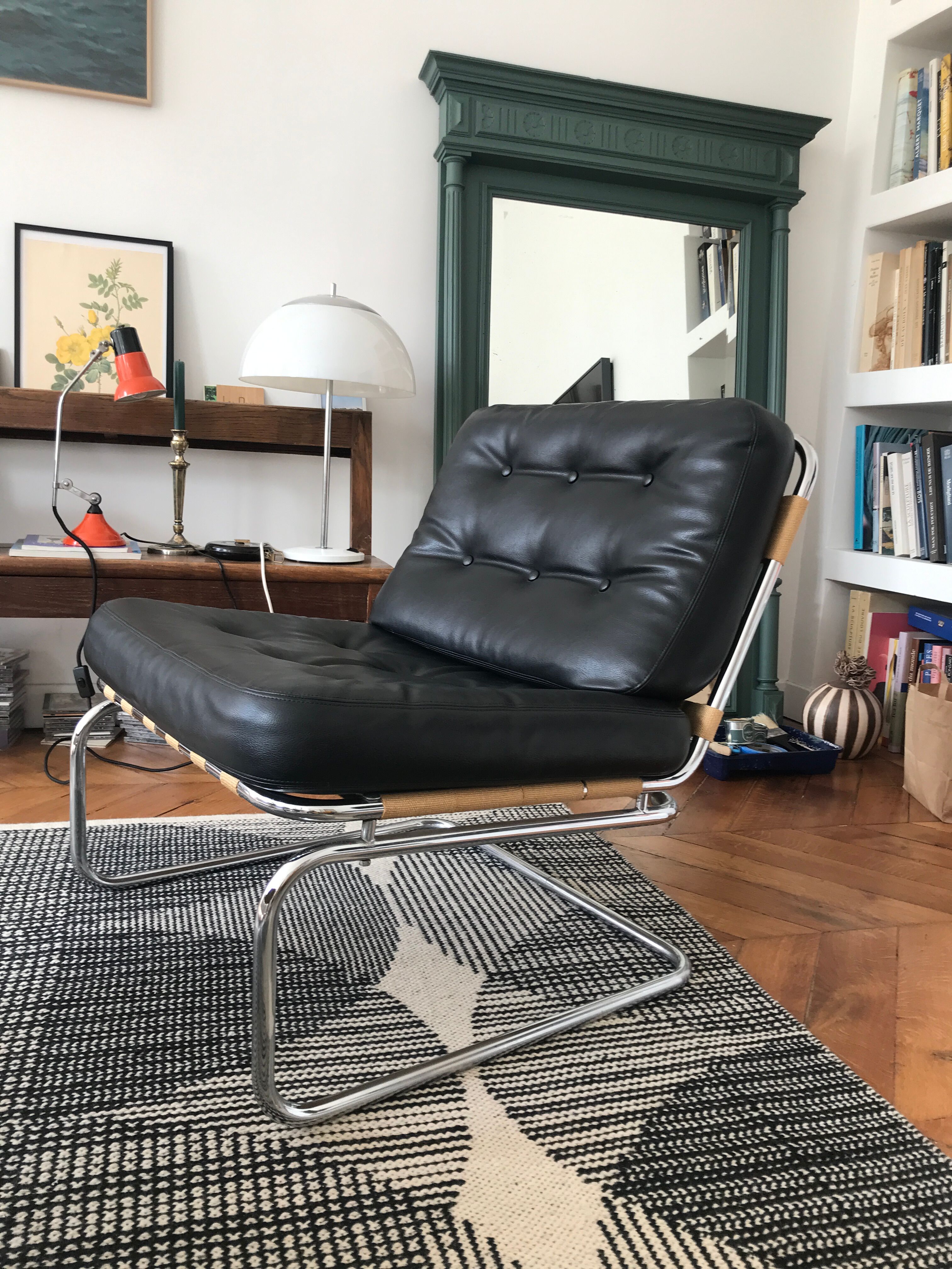 Chrome and leatherette armchair