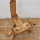 Brutalist chair in solid wood, European handcrafted work from the early 20th century.