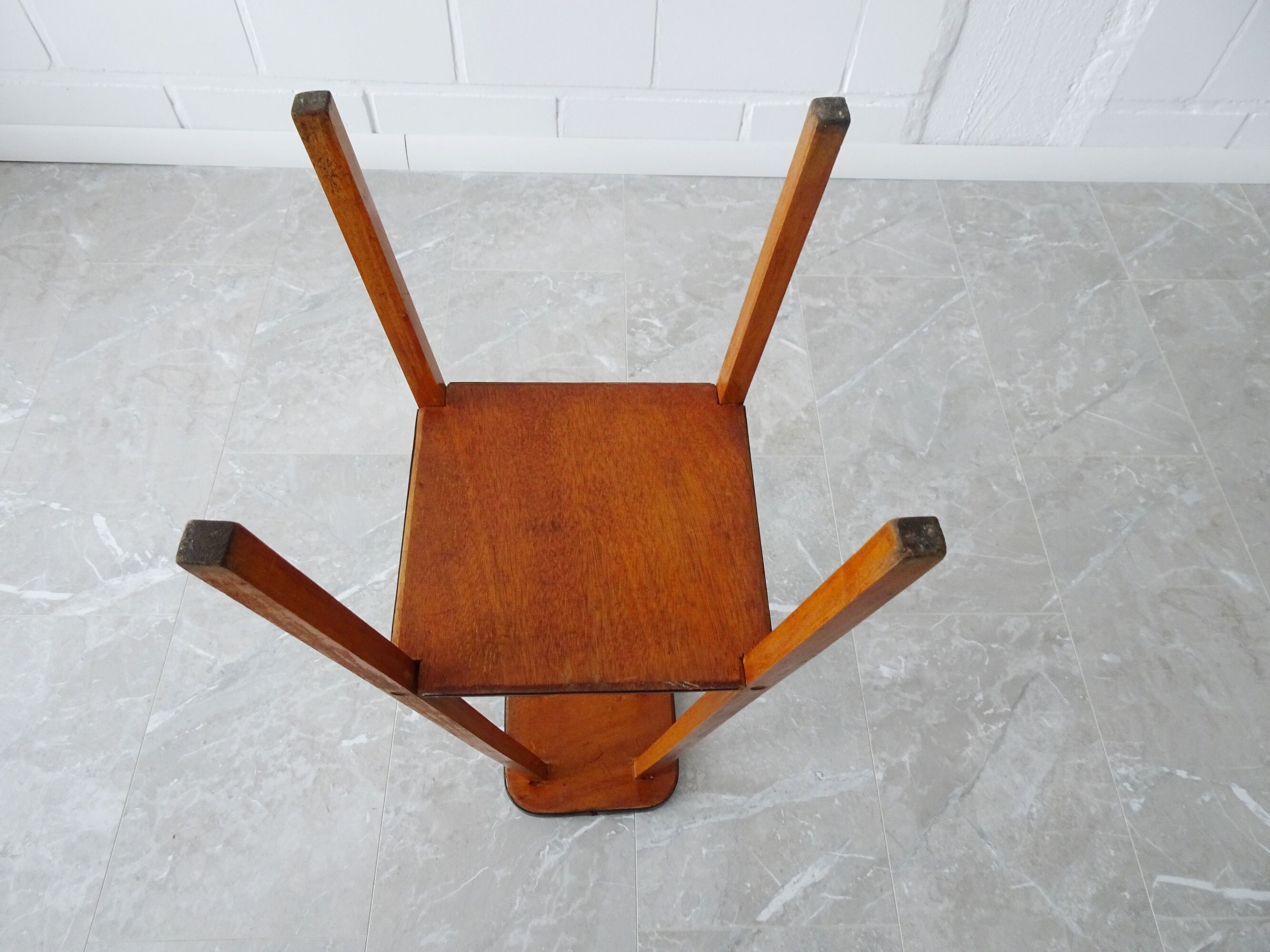 Plant stand made of wood and formica with two shelves, flower column