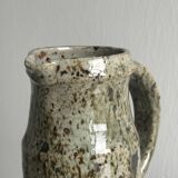 Green and brown speckled handcrafted stoneware pitcher