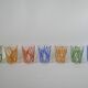 Colorful designer set composed of 7 liqueur glasses and a seventies 70s carafe