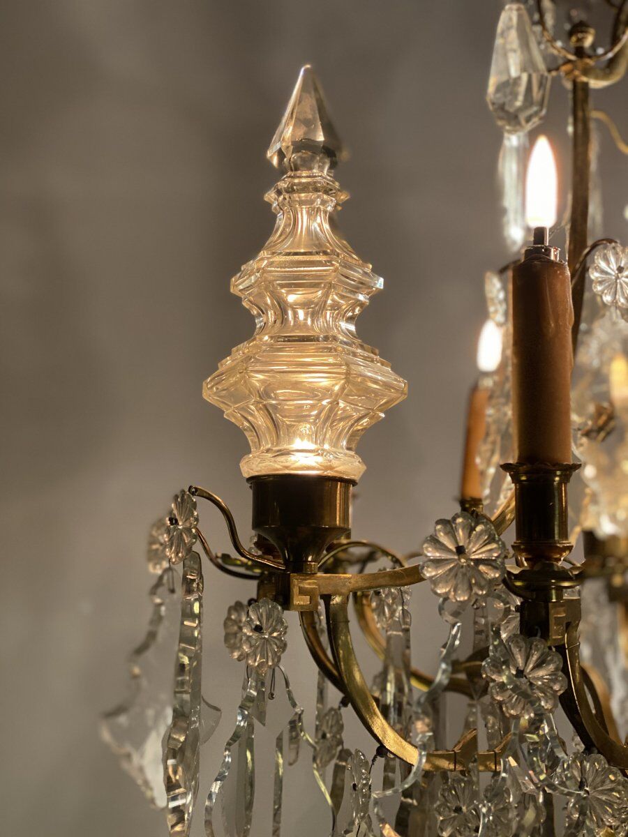 Golden bronze luster garnished with transparent and mordoréed pampilles
