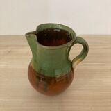 Green and brown ceramic pitcher