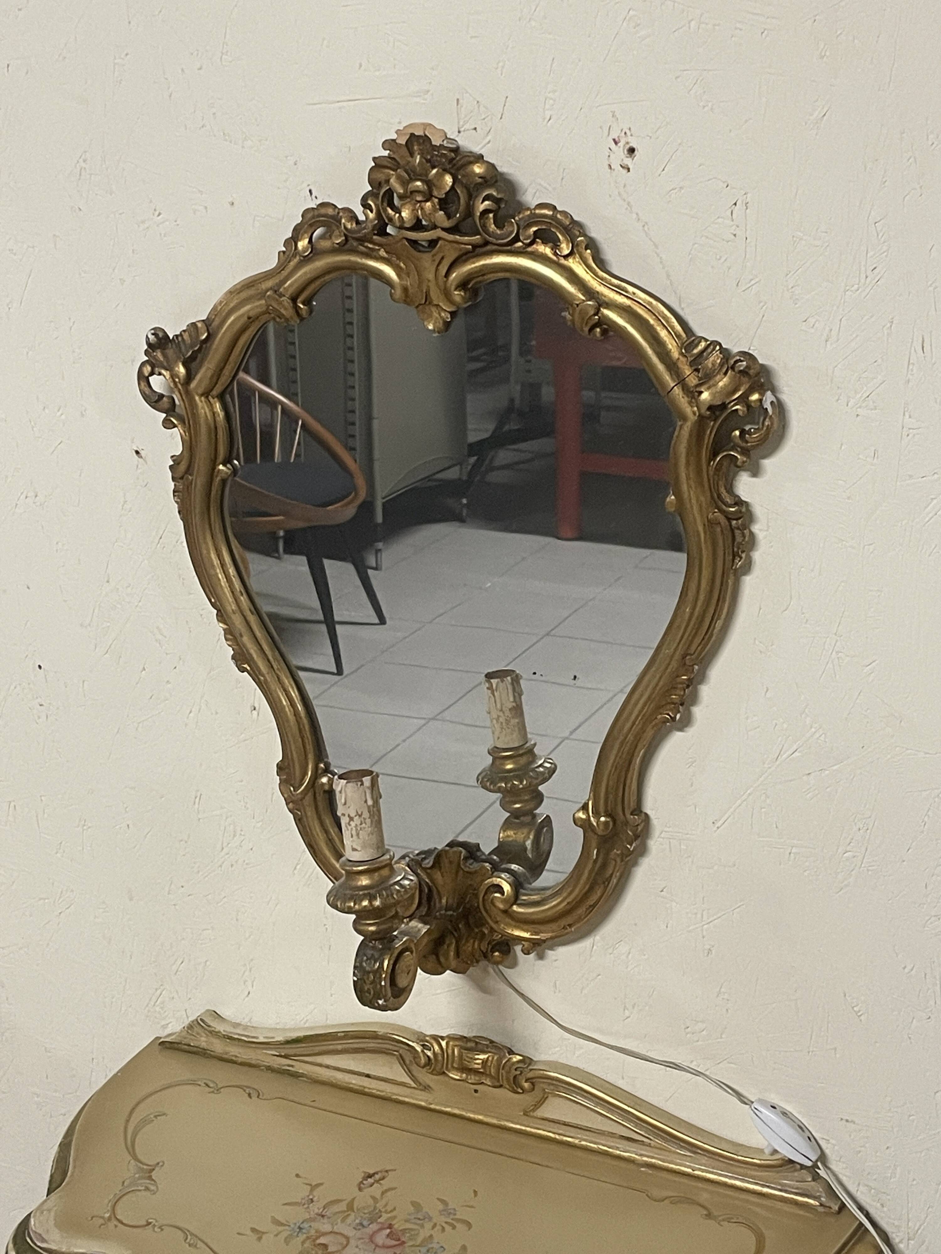 Pair of wall-mounted consoles with a mirror in Louis XV style.