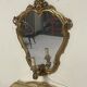 Pair of wall-mounted consoles with a mirror in Louis XV style.