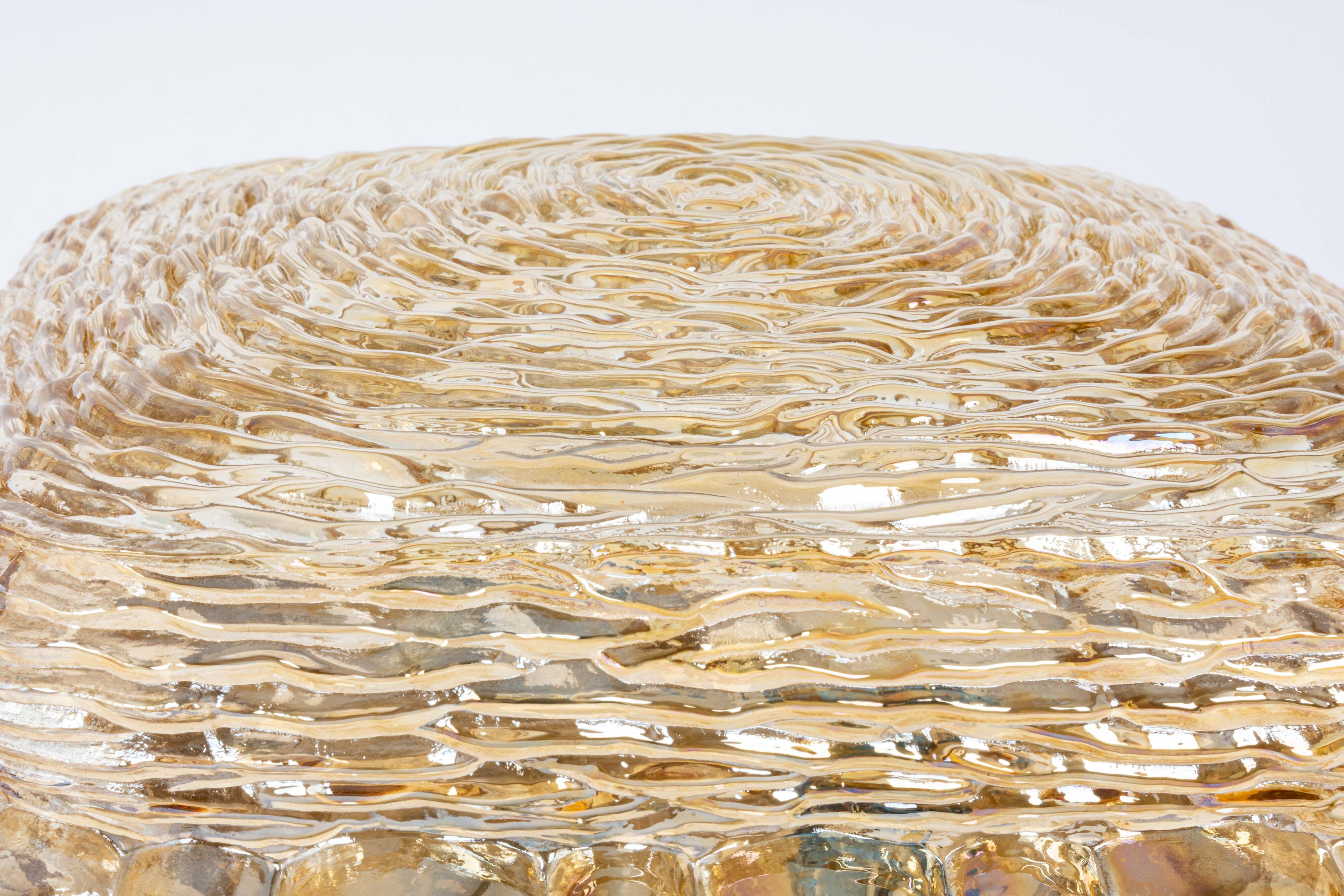 Amber glass wall light in the shape of a fingerprint, Germany, 1970s.