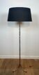 Bronze floor lamp in faux-bamboo style by Maison Baguès.