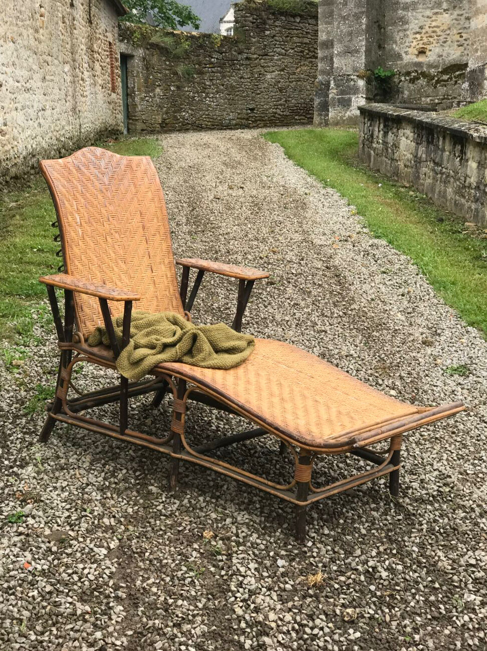 Old rattan lounger.