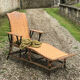 Old rattan lounger.