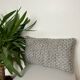 Bi-sided cushion beige black white pattern