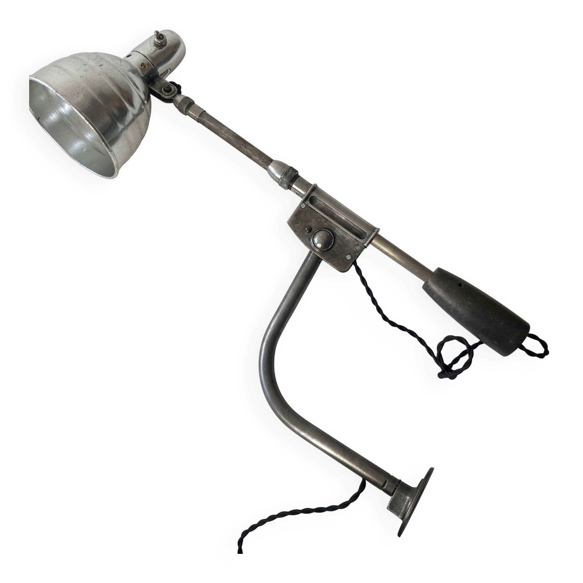 Old industrial wall light with counterweight.