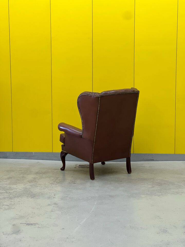 Fauteuil Chesterfield traditionnel anglais en cuir