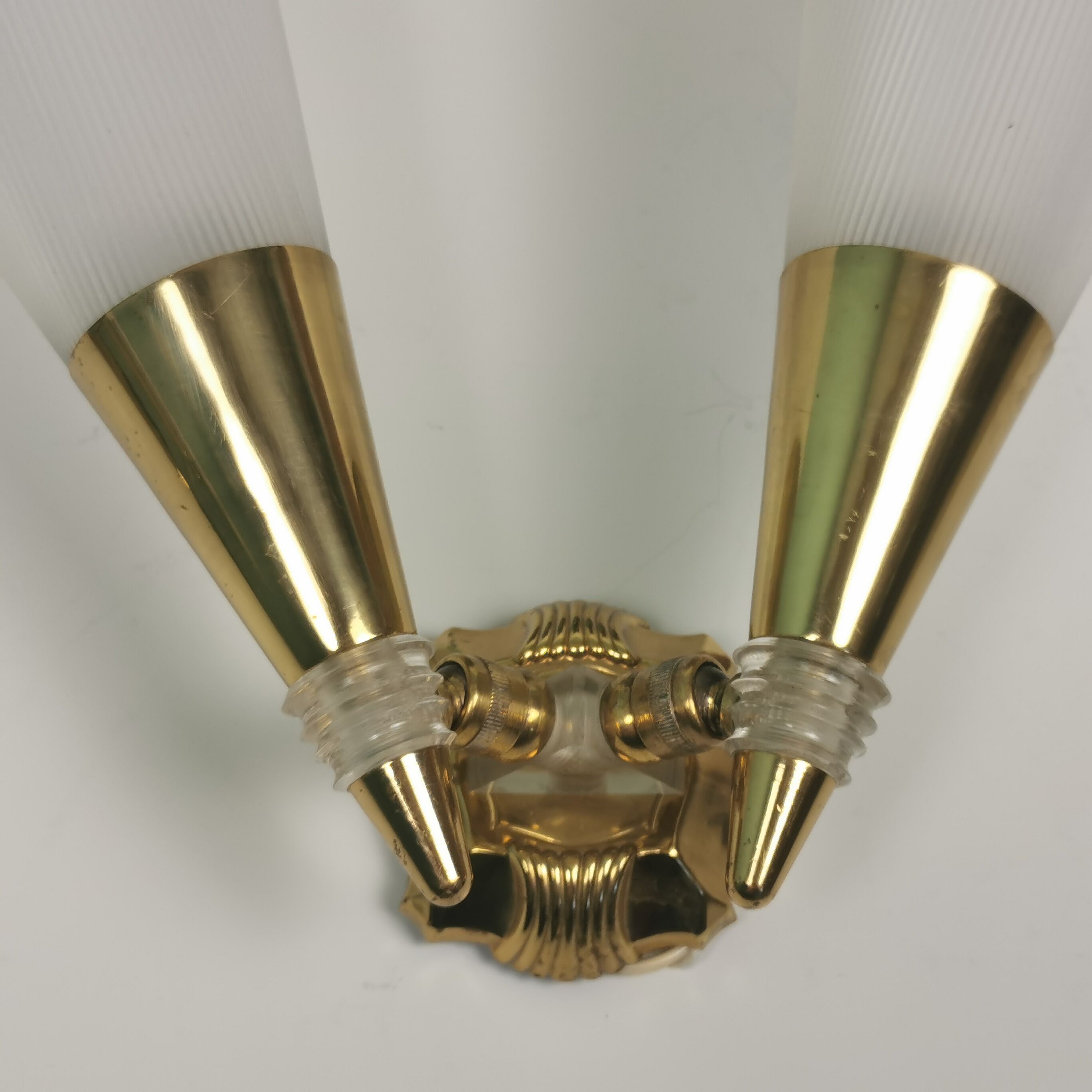 Applique double laiton