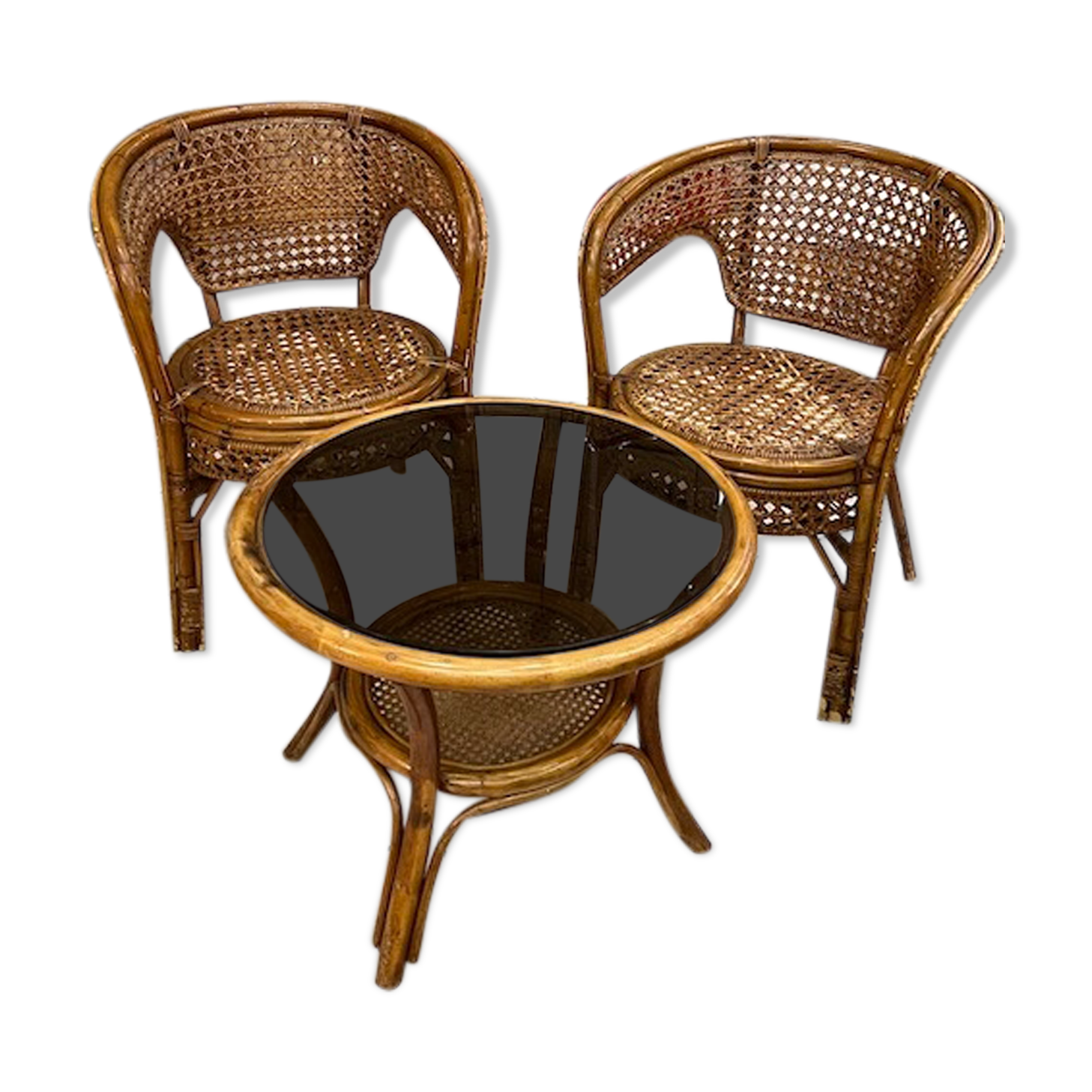 Rattan living room and cannage consisting of 2 armchairs and a coffee table