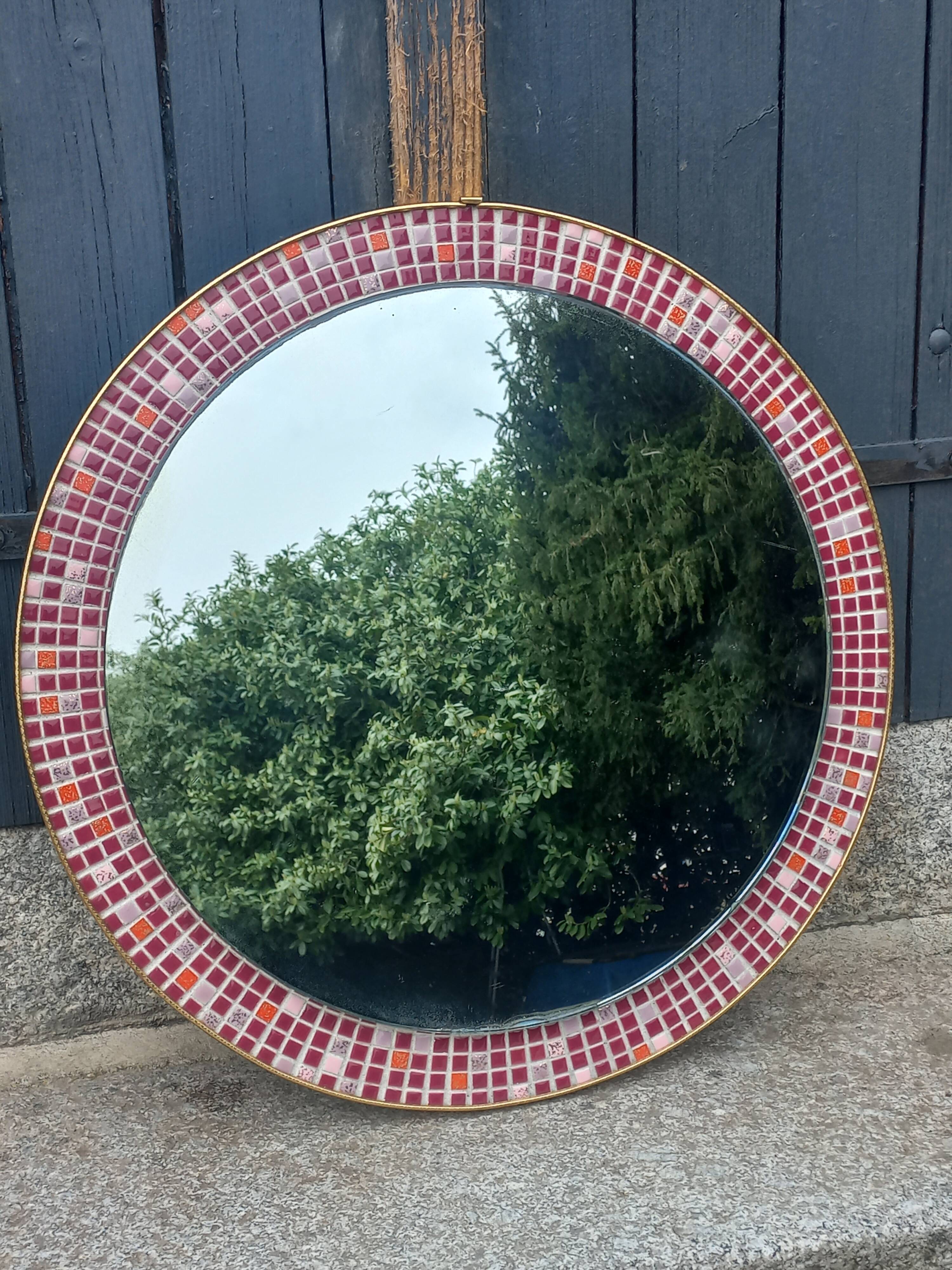 Vintage ceramic mirror from the 1960s.