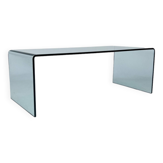 Postmodern coffee table made entirely of glass. Modernist and bitches minimalist look.